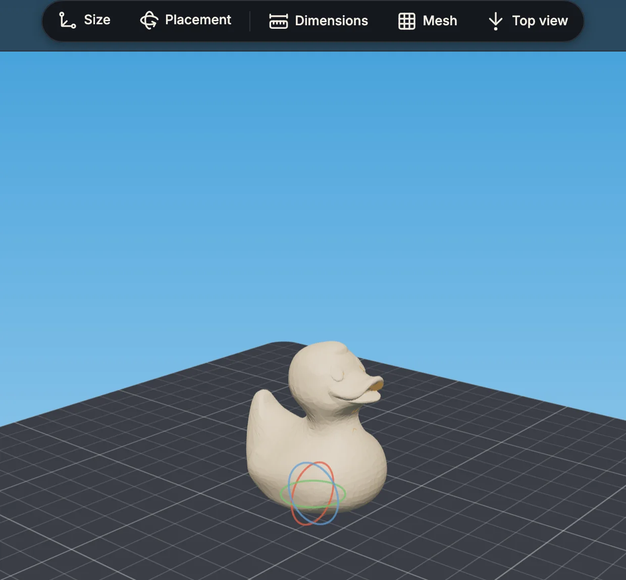 The duck stands base-down on the bed